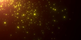 小的金色颗粒和星星飞在黑暗的背景上