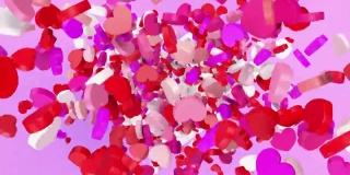 心形红色和白色玫瑰花瓣在粉红色的背景下4K分辨率