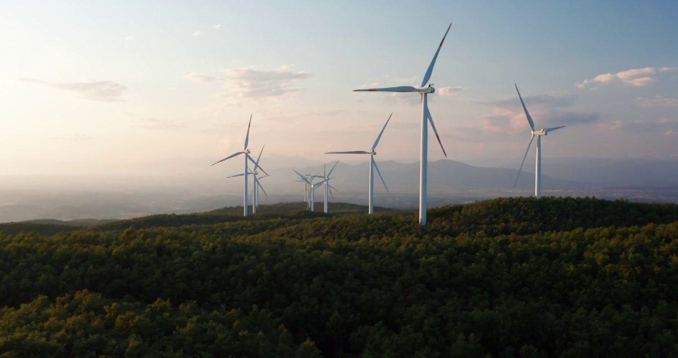 航拍的风车旋转的力量，风力和产生可再生能源的绿色生态方式，以地球上的日落。