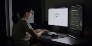 亚洲妇女在家庭办公室工作到很晚，为她的工作计划在网上搜索信息数据。
