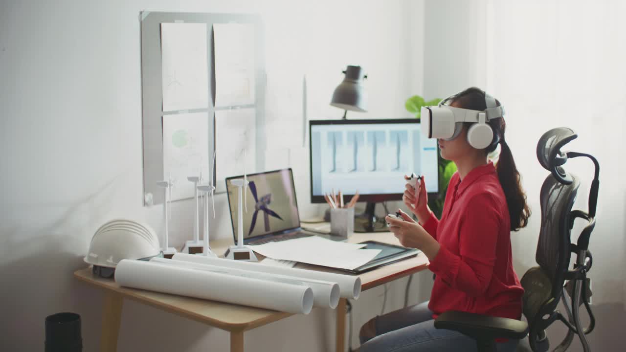 女工程师戴着虚拟现实耳机在Metaverse工作
