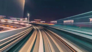 火车穿越未来霓虹灯城市的超慢速摄影视频素材模板下载