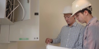 亚洲工程师检查电力系统的建设