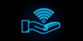 免费wifi区霓虹灯标志在手中的图标。这里免费wifi标志概念。运动图形