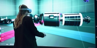汽车工程师使用VR软件在交互环境中展示电动马达和车辆平台。为她的项目使用虚拟现实耳机和控制器的女工程师。