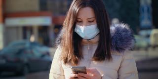 在城市街道上，一名妇女戴着医用口罩，以防止空气污染和冠状病毒感染