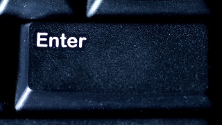 人体手指按下计算机键盘上的回车键的宏视频素材模板下载