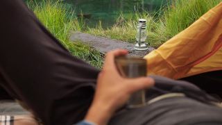 露营夏天的场景男人在帐篷里喝酒放松视频素材模板下载