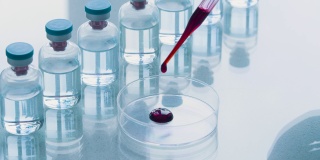 实验室里的生物武器的发展——移液器将血样滴入培养皿以研究有毒物质的影响的特写镜头