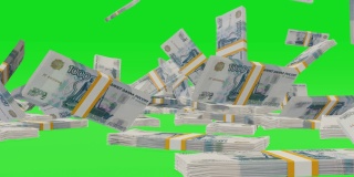 大量的钱落在彩色背景上。1000卢布纸币。成堆的钱。