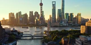 航拍上海日出时的城市天际线