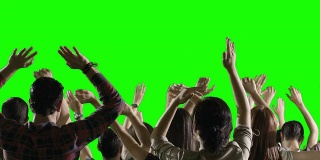 慢镜头一群粉丝在绿色屏幕上跳舞