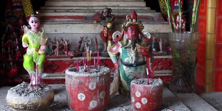 中国和泰国的宗教雕像在中国澳门的街道神社