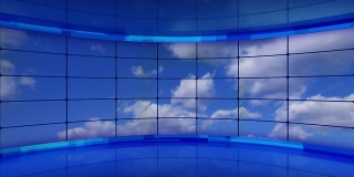 云在蓝色的虚拟工作室的屏幕上循环