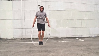 运动男性锻炼跳绳慢动作视频素材模板下载