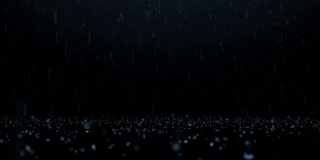 雨和跳跃的水滴在黑暗的背景