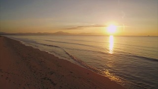 无人机拍摄的日落海景视频素材模板下载
