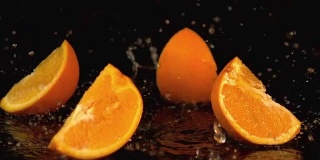 三个橙子掉落的慢动作视频