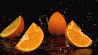 三个橙子掉落的慢动作视频视频素材模板下载