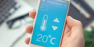 在智能手机上的智能家居应用程序上改变温度