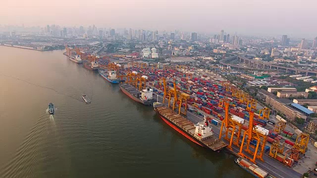 Aerial view of container ships and lifting cranes in the Port of Bangkok.