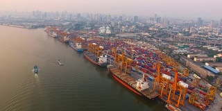 Aerial view of container ships and lifting cranes in the Port of Bangkok.