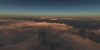 飞越云彩在日落4k