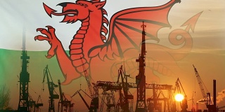 日落时威尔士旗帜的工业概念