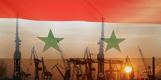 日落时叙利亚国旗的工业概念