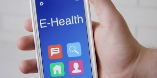 智能手机上的电子保健概念应用。男人用手机应用。