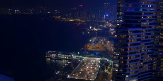夜间照明香港市中心海湾建筑码头港口屋顶全景4k中国