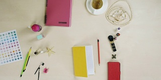 Top view of table with female accessorize, stop motion effect