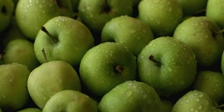 新鲜的绿色苹果充分框架使用作为背景
