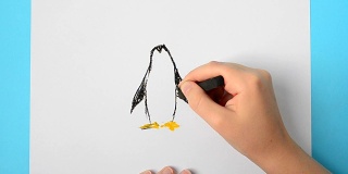 我们画了一只企鹅。这个孩子画了这幅画。