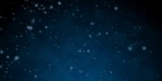 飘落的真正的雪花，大雪，暴风雪天气，拍摄在深蓝色的背景