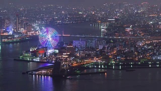 4K延时:大阪湾在美丽的夜晚与游乐园在美丽的日本视频素材模板下载