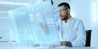 在未来的实验室里，男性和女性科学家致力于透明电脑显示器，他们试图延长人类寿命。屏幕显示各种与人类相关的信息图表和数据。