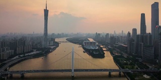 中国日落时间天空广州市中心城市景观珠江猎得桥航拍全景4k时间