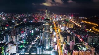中国夜景照亮了著名的深圳市区，4k时间的航拍全景视频素材模板下载