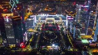 中国夜景时间照亮深圳著名展览中心航拍全景，4k时间间隔视频素材模板下载