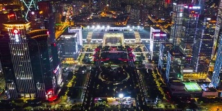 中国夜景时间照亮深圳著名展览中心航拍全景，4k时间间隔
