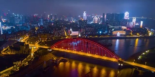 中国夜景时间照亮武汉城市景观青川大桥航拍全景4k时间流逝
