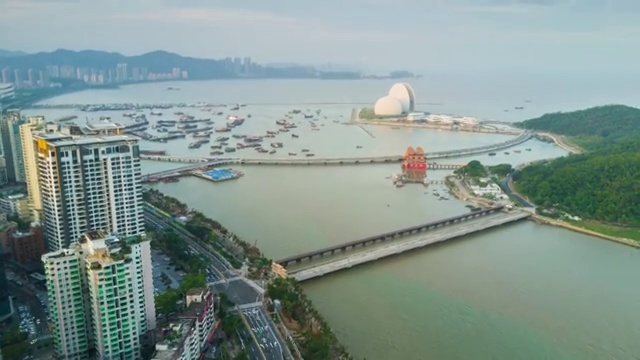 中国黄昏日落时间珠海湾著名歌剧院航拍全景4k时间流逝