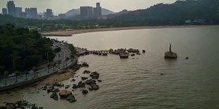 中国日落时间珠海著名渔女纪念碑湾航拍全景4k时间流逝