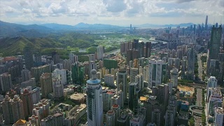 中国深圳城市景观晴天香港边境航拍全景4k视频素材模板下载