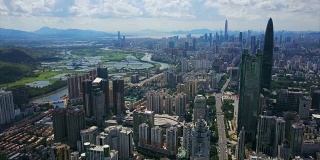 中国深圳城市景观晴天香港边境河航拍全景4k
