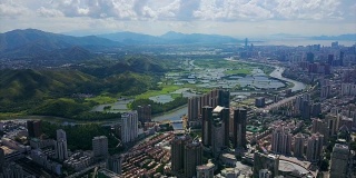 中国深圳城市景观晴天香港边境河航拍全景4k