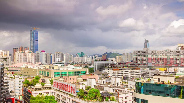 阳光明媚的一天深圳城市景观屋顶全景4k时间推移中国