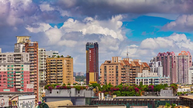 阳光明媚的深圳城市景观屋顶全景4k时间推移中国