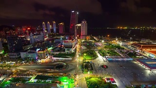 夜晚照亮了珠海城市景观拱北口岸入口拥挤的广场湾屋顶全景4k时间流逝中国视频素材模板下载